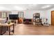 Living room with entertainment center, contemporary fireplace, and modern furniture at 25531 Mosier Cir, Conifer, CO 80433