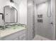 Stylish bathroom with glass vessel sink, decorative tile accents, and modern shower fixture at 6668 Walker Ct, Niwot, CO 80503