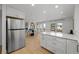 Open-concept kitchen featuring an island, stainless steel appliances, and an adjacent dining area at 6668 Walker Ct, Niwot, CO 80503