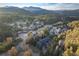 Overhead view of townhome nestled in a scenic, mountainous landscape at 5077 Camel Heights Rd # C, Evergreen, CO 80433