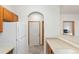 Efficient kitchen with bright white appliances offering access to the bedroom and laundry at 5077 Camel Heights Rd # C, Evergreen, CO 80433