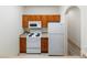 Efficient kitchen featuring bright white appliances and light countertops at 5077 Camel Heights Rd # C, Evergreen, CO 80433