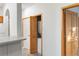 Convenient laundry closet with a stackable washer and dryer is tucked away near the kitchen at 5077 Camel Heights Rd # C, Evergreen, CO 80433