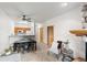 Bright and airy living room features a dining area, fireplace and modern decor at 5077 Camel Heights Rd # C, Evergreen, CO 80433