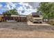 Large RV parked near a detached garage and shed providing ample parking and storage at 6736 Grove St, Denver, CO 80221