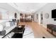 Open-concept living space with kitchen, dining, and living areas featuring modern finishes and ample natural light at 7600 Landmark Way # 914, Englewood, CO 80111