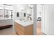 Small bathroom with a single vanity and access to the bedroom at 7600 Landmark Way # 914, Englewood, CO 80111