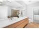 Spa-like bathroom with double vanity, large shower, and soaking tub at 7600 Landmark Way # 914, Englewood, CO 80111