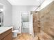 Bathroom with walk-in shower, toilet and access to a large closet at 7600 Landmark Way # 914, Englewood, CO 80111