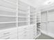 Large walk-in closet with ample shelving and drawers at 7600 Landmark Way # 914, Englewood, CO 80111