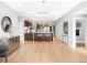 Open concept kitchen with island, stainless steel appliances, and hardwood floors at 7600 Landmark Way # 914, Englewood, CO 80111