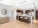 Open concept kitchen with island and breakfast bar at 7600 Landmark Way # 914, Englewood, CO 80111