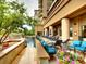 Luxury pool area with waterfall and comfortable seating at 7600 Landmark Way # 914, Englewood, CO 80111