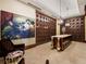 Elegant wine cellar featuring individual wine storage units and a large painting at 7600 Landmark Way # 914, Englewood, CO 80111