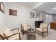 Cozy finished basement featuring comfortable seating, tasteful decor, and ample lighting at 2851 W 23Rd Ave # 1, Denver, CO 80211