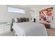 Bright bedroom with modern decor, including an eye-catching art piece and stylish nightstand, creating a welcoming atmosphere at 2851 W 23Rd Ave # 1, Denver, CO 80211