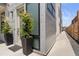 Modern home entrance with stylish plants and a sleek exterior design at 2851 W 23Rd Ave # 1, Denver, CO 80211