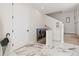 Hallway with marble floors and white walls, with steps leading down at 2851 W 23Rd Ave # 1, Denver, CO 80211