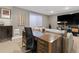Cozy living room featuring a large desk, comfortable seating, and modern entertainment system at 2851 W 23Rd Ave # 1, Denver, CO 80211