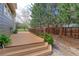 Inviting outdoor deck and stone walkway, ideal for enjoying the peaceful surroundings and outdoor relaxation at 2901 Madison Ln, Broomfield, CO 80023