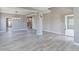 Open concept living room with neutral paint and hardwood floors at 2901 Madison Ln, Broomfield, CO 80023