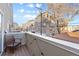 Private balcony overlooks the neighborhood, perfect for relaxing and enjoying the city view at 1300 Garfield St # 9, Denver, CO 80206