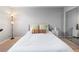 Bright bedroom with a comfortable bed and built in mirrored closet at 1300 Garfield St # 9, Denver, CO 80206