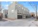 Rear view of building showcasing garages at 1300 Garfield St # 9, Denver, CO 80206