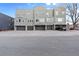 Three-story building with attached garages at 1300 Garfield St # 9, Denver, CO 80206