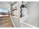 Modern kitchen with white cabinets and stainless steel appliances at 1300 Garfield St # 9, Denver, CO 80206