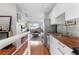 Modern kitchen with stainless steel appliances and a butcher block countertop at 1300 Garfield St # 9, Denver, CO 80206