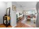 Bright living room with hardwood floors, modern furniture, and access to a balcony at 1300 Garfield St # 9, Denver, CO 80206