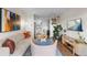 Open concept living room with kitchen view, stylish decor, and comfortable seating at 1300 Garfield St # 9, Denver, CO 80206
