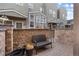 Private patio with brickwork and seating at 1300 Garfield St # 9, Denver, CO 80206