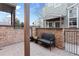 Private patio with brickwork and seating at 1300 Garfield St # 9, Denver, CO 80206