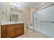 Bathroom features a glass shower, granite vanity, and modern toilet at 1130 Summit View Dr, Louisville, CO 80027