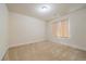 Bedroom with carpet floor, a window, and trim at 1130 Summit View Dr, Louisville, CO 80027