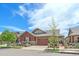 Charming single-Gathering home with a two-car garage, stone accents, and well-kept landscaping at 1130 Summit View Dr, Louisville, CO 80027