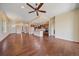 Hardwood floors in the open concept living space adjacent to the kitchen and entrance at 1130 Summit View Dr, Louisville, CO 80027