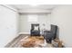 Inviting basement area with LVP flooring and cozy seating arrangement at 3328 S Danube St, Aurora, CO 80013
