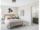 Serene bedroom featuring stylish decor, comfortable furnishings, and ample natural light at 3328 S Danube St, Aurora, CO 80013