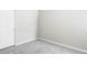 Cozy bedroom with gray carpet and a spacious closet with white doors at 3328 S Danube St, Aurora, CO 80013