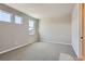 Neutral colored walls and carpet in this empty bedroom with two sunny windows and plenty of room for furniture at 4748 Weitbrec Ln, Castle Rock, CO 80104