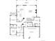 Detailed floor plan showcasing the layout of the first floor, including kitchen, living spaces, and garage at 4748 Weitbrec Ln, Castle Rock, CO 80104