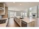 Stylish kitchen with a large island, stainless steel appliances, and an open layout at 4748 Weitbrec Ln, Castle Rock, CO 80104