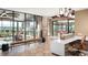 Bright lobby boasts stone accents, community spaces, and oversized windows framing scenic views at 4748 Weitbrec Ln, Castle Rock, CO 80104