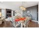 Open-concept dining area with stylish decor and ample natural light at 1669 Stable View Dr, Castle Pines, CO 80108