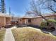 A cozy single-Gathering home with a front yard, sidewalk, and inviting entrance at 732 Poplar St, Denver, CO 80220