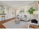 Cozy living room with a modern sofa, stylish rug, and bright natural light at 732 Poplar St, Denver, CO 80220