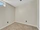 Unfurnished room with carpet, base trim, and window, great for storage or easily personalized at 732 Poplar St, Denver, CO 80220